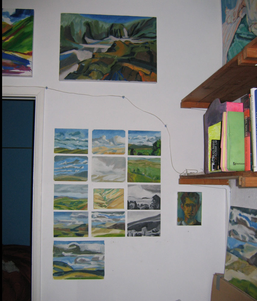 photo of studio wall with paintings